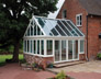 Gabled Ended Conservatory With Aluminium roof Cappings